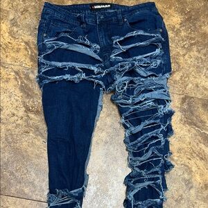 Distressed Blue Denim Jeans